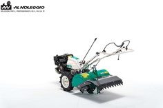 Motocoltivatore con slitta di regolazione profondità 